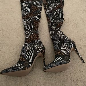 Brand new never worn Knee high animal print boots